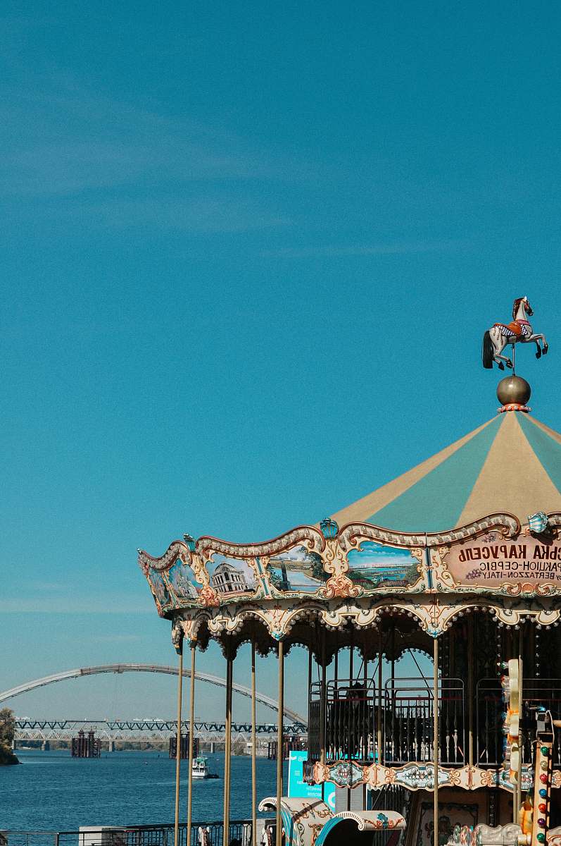 blue brown carousel theme park